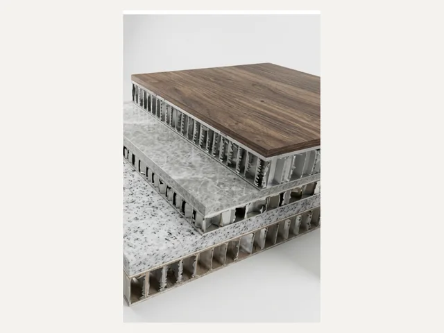 Natural stone veneer bonded to aluminium honeycomb backing