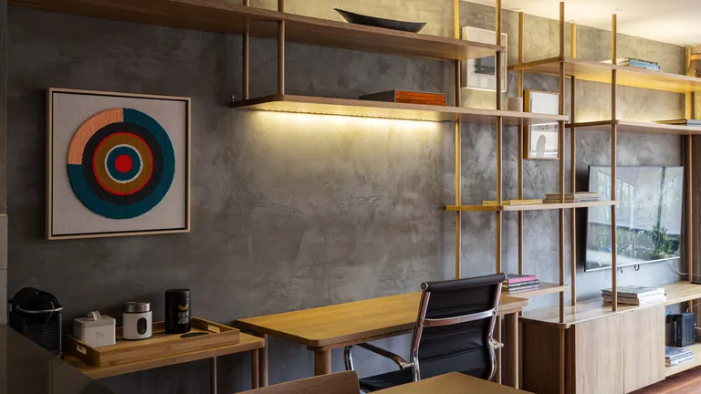 Home office with metal-framed open shelving